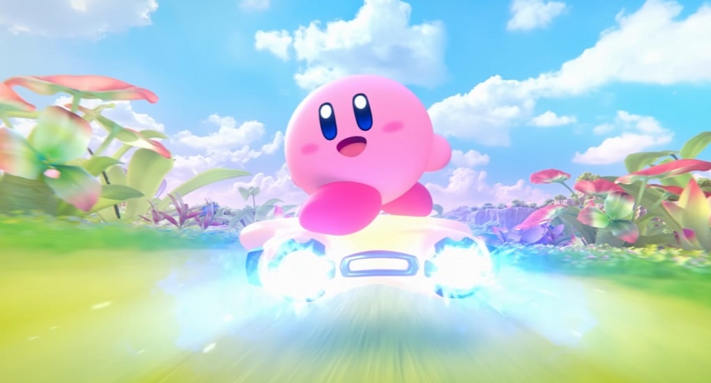 Kirby looks back and smiles as he races.