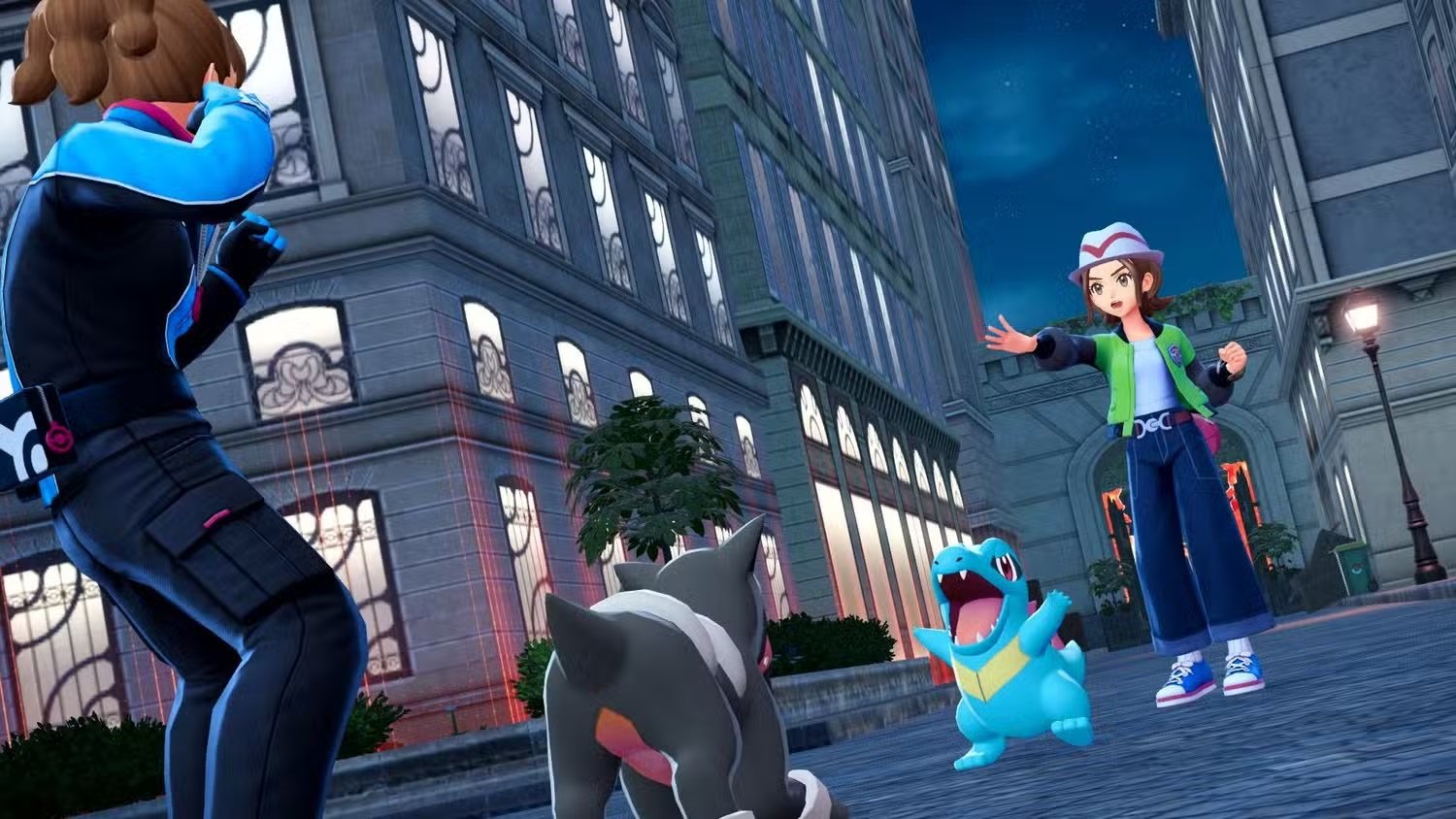 Pokemon fight on the streets at night.